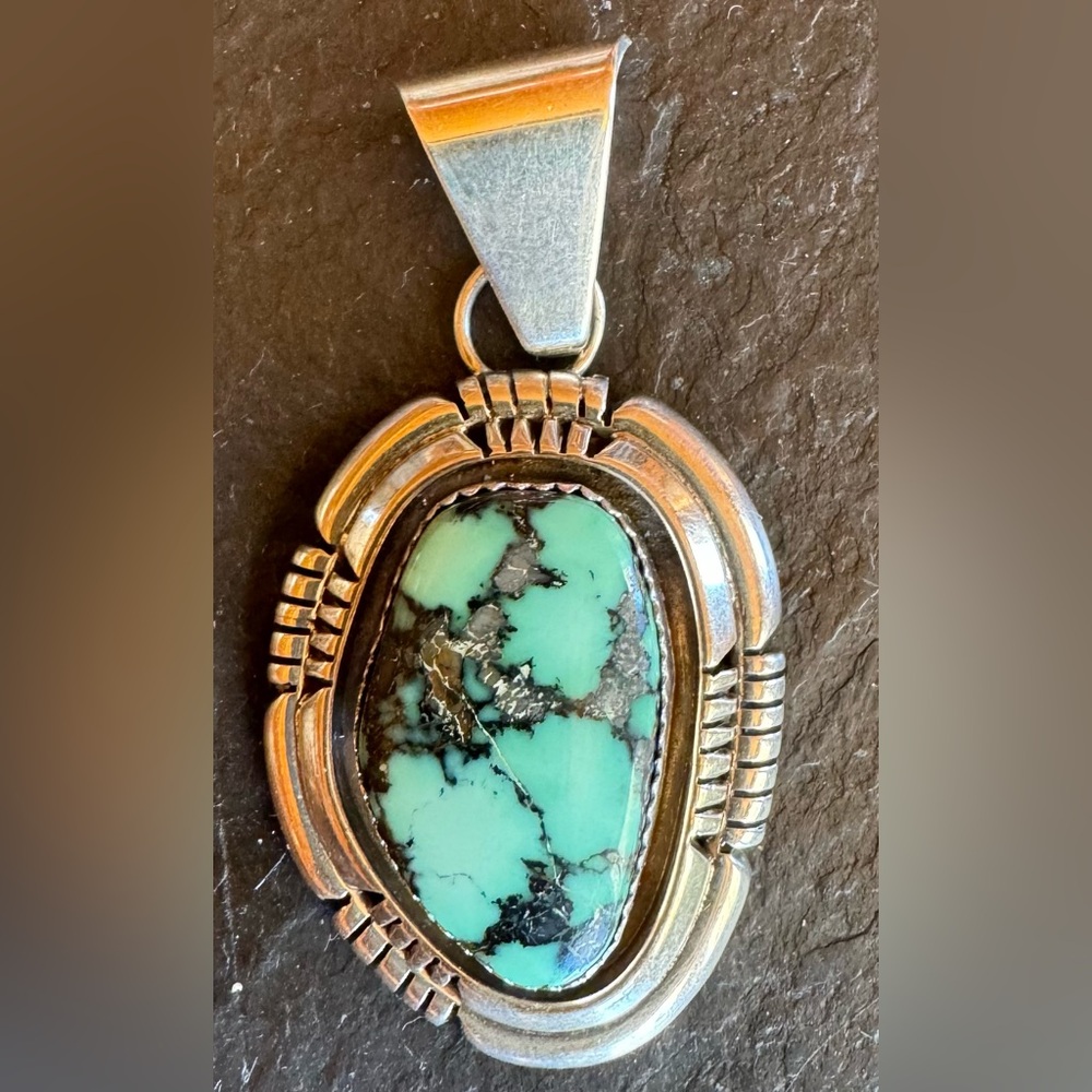 Beautiful Ray Begay turquoise pendant.